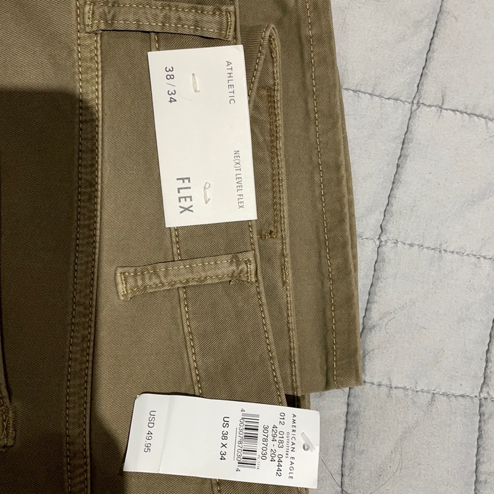 Men’s American Eagle tan Next level Flex pants NWT